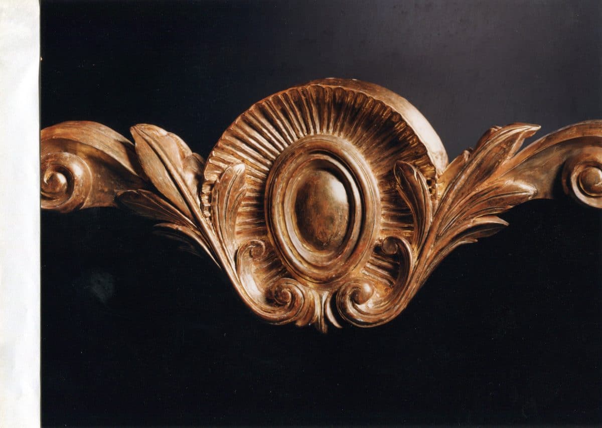 Lower section of carved mirror gilded detail
