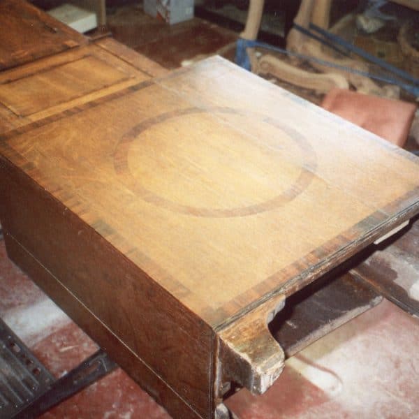Stabilising and replacing missing veneers on an oak-veneered longcase