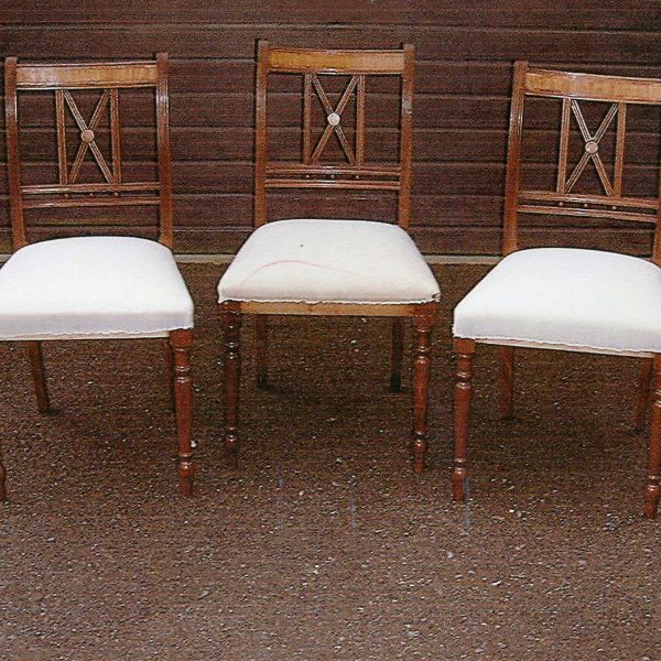 Two copies and original of x-back chair
