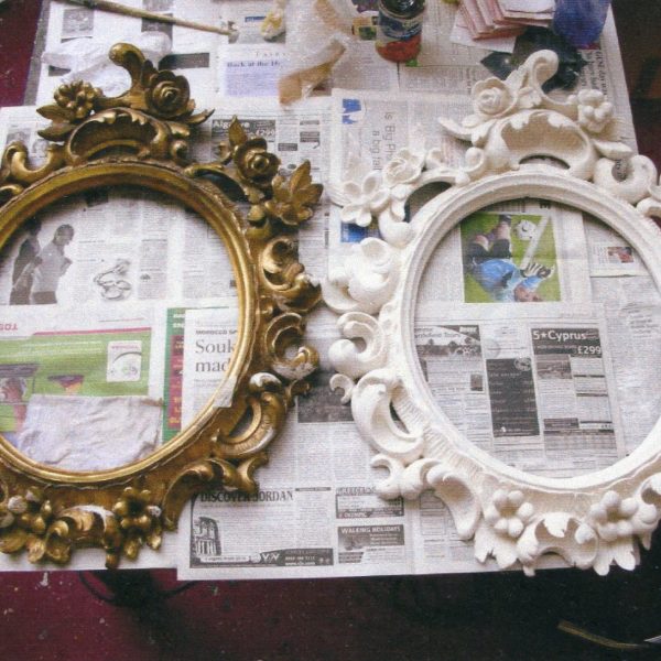 Pair of Rococco carved and water gilt mirrors, one is copy