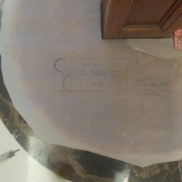 Curve-edge bottom step on ornate staircase